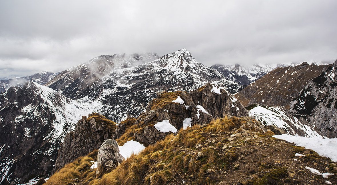 A mountain range with snow on top of it.