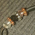 A close up of the end of an electrical cord.