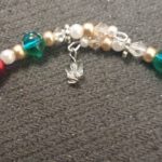 A close up of the beads on a bracelet