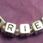 A close up of the word " aries ".