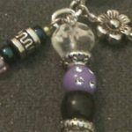 A close up of the beads on a key chain