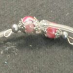 A close up of the end of a bracelet