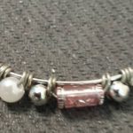 A close up of the beads on a bracelet