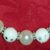 A close up of the beads on a necklace